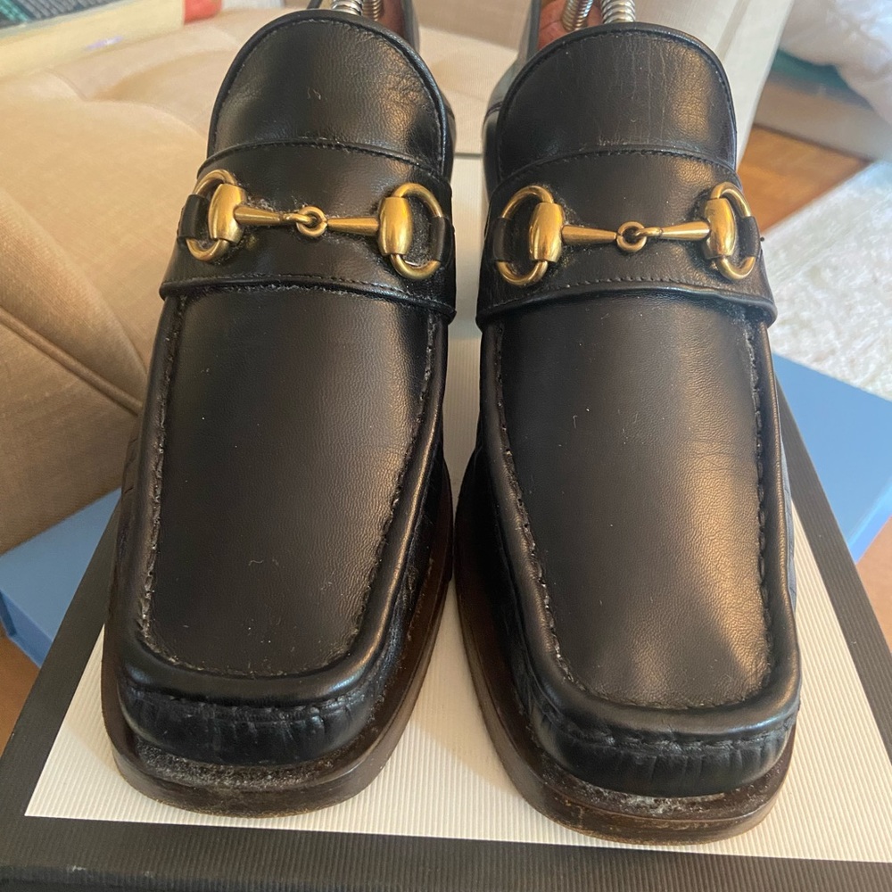 Gucci Black Leather Heeled Boots with Gold Accents